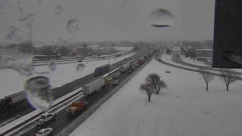 May be an image of snowplow, train, fog, railroad and road