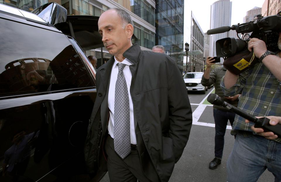 California businessman Stephen Semprevivo departs federal court Tuesday, May 7, 2019, in Boston, after pleading guilty to charges that he bribed the Georgetown tennis coach to get his son admitted to the school. (Photo: Steven Senne, AP)