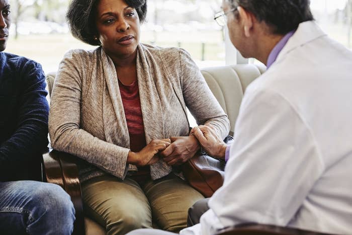 A doctor speaking with a Black patient