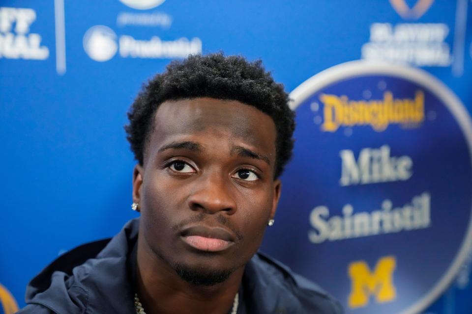 Michigan defensive back Mike Sainristil listens to a question during a welcome event at Disneyland on Wednesday, Dec. 27, 2023, in Anaheim, California.