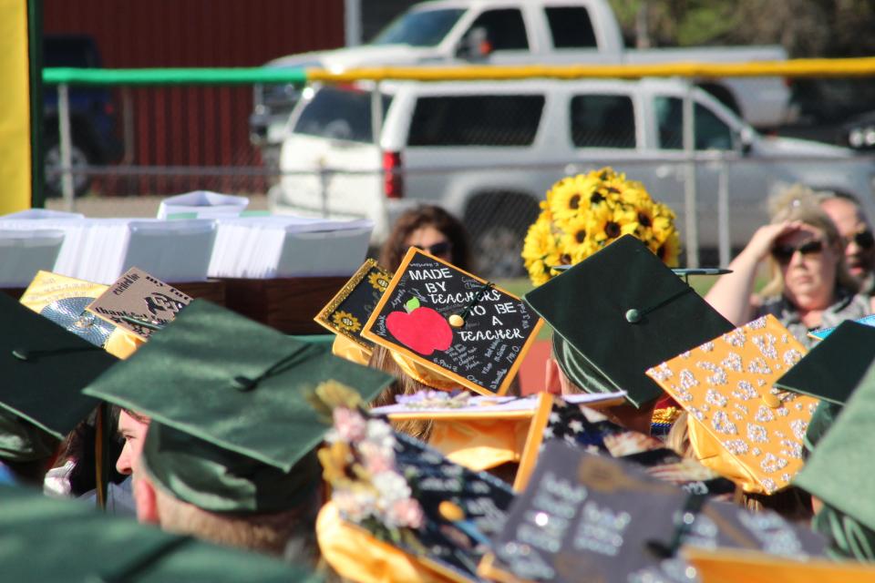 Students decorated their caps for the Pueblo County High School graduation ceremony held at Pueblo County High School on May 27, 2023.