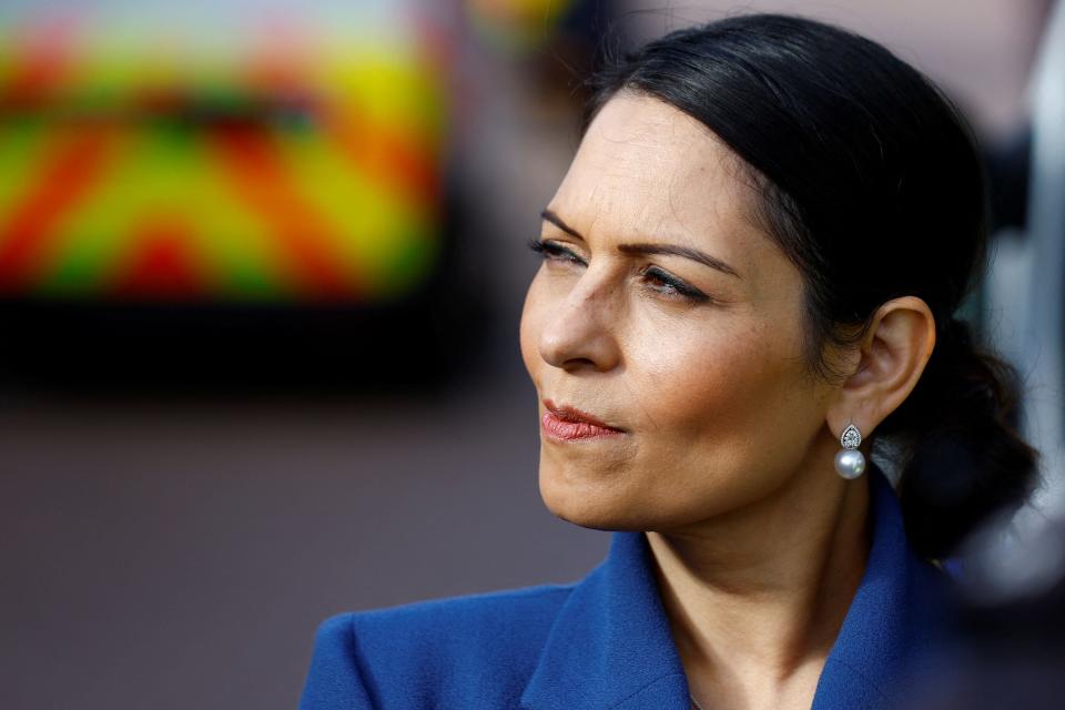 File: Britain’s home secretary Priti Patel reacts during a visit with members of the Thames Valley Police, at the Milton Keynes Police Station, in Milton Keynes, on 31 August 2022 (POOL/AFP via Getty Images)