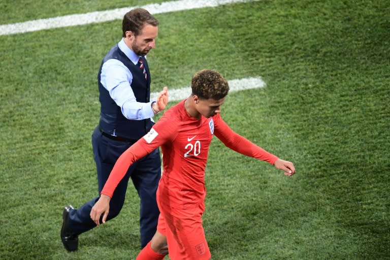 Dele Alli leaves the pitch during England's World Cup opener against Tunisia