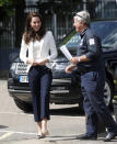 <p>Kate went for a nautical look to visit the 1851 Trust. She chose cropped navy sailor trousers by J. Crew and a fitted white blazer from high street retailer Zara. The Duchess also chose J. Crew for her shoes, wearing a low-heeled tweed pair.</p><p><i>[Photo: PA]</i></p>