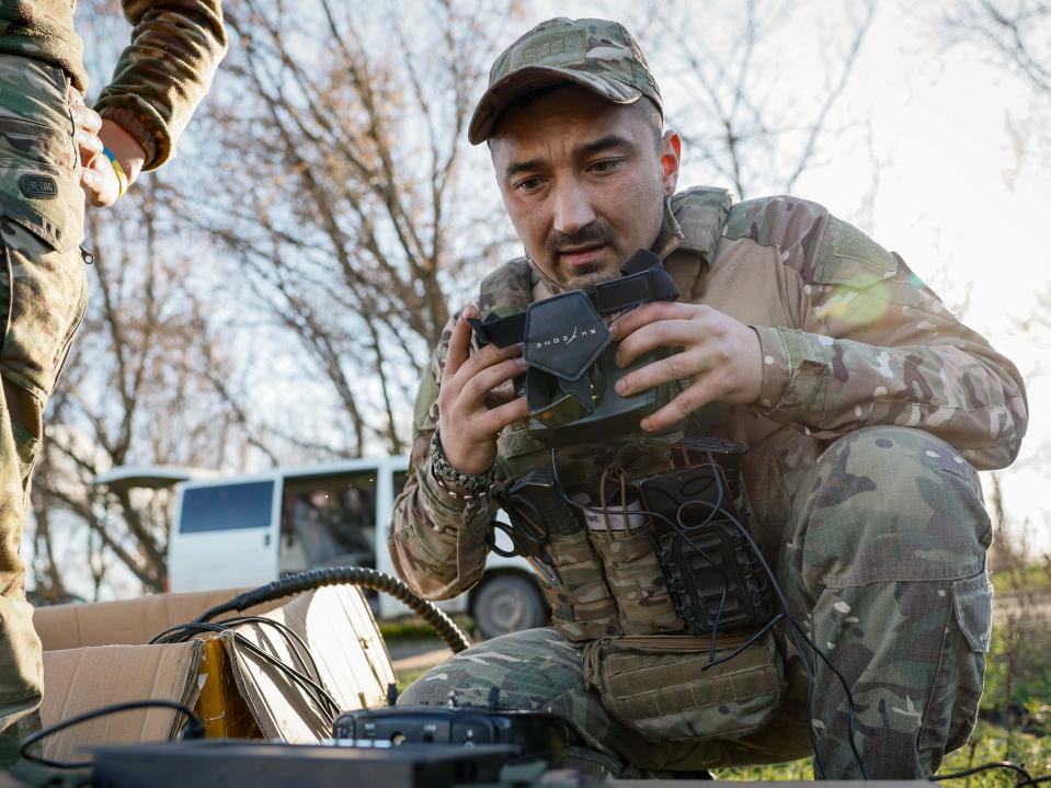 Serviceman of the 80th Airborne Assault Brigade prepares to operates a First Person View (FPV)-drone in Donetsk region (REUTERS)