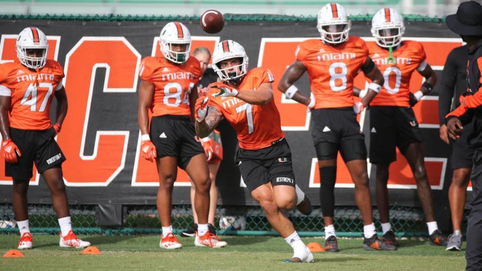 Miami Hurricanes wide receiver Xavier Restrepo (7) catches the ball during practice drills at Greentree Practice Field at the University of Miami in Coral Gables on Tuesday, August 9, 2022. Al Diaz/adiaz@miamiherald.com