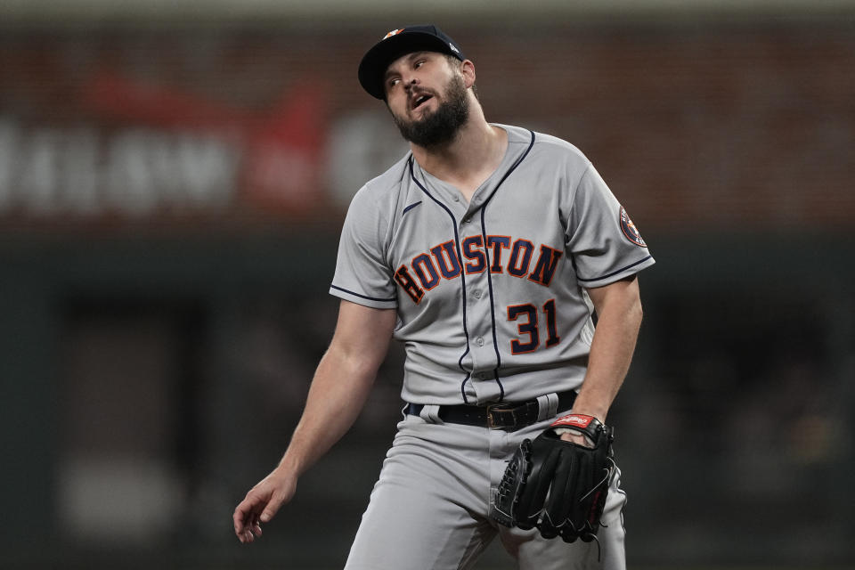 Houston Astros relief pitcher Kendall Graveman reacts after their win in Game 5 of baseball's World Series between the Houston Astros and the Atlanta Braves Monday, Nov. 1, 2021, in Atlanta. The Astros won 9-5. The Braves lead the series 3-2 games. (AP Photo/David J. Phillip)