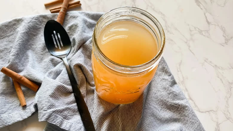 Apple cider cocktail in glass jar 