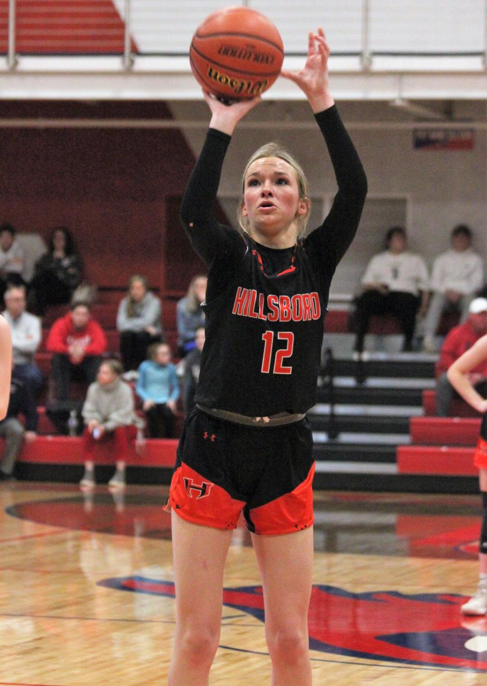 Hillsboro's Layne Rupert shoots a free throw against Quincy Notre Dame during the Class 2A Pleasant Plains girls basketball sectional semifinal on Tuesday, Feb. 21, 2023.