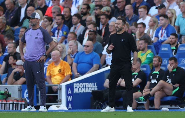 Brighton head coach Roberto De Zerbi, right, is a big admirer of Jurgen Klopp, left