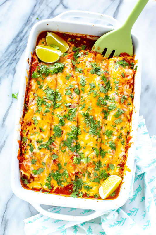 <p>Eating Instantly</p><p>These Instant Pot chicken enchiladas are filled with tender pulled chicken, bell peppers and corn then topped with an easy enchilada sauce and cheese for a full meal!</p><p><strong>Get the recipe: <a href="https://eatinginstantly.com/instant-pot-chicken-enchiladas/" rel="nofollow noopener" target="_blank" data-ylk="slk:Instant Pot Chicken Enchiladas;elm:context_link;itc:0;sec:content-canvas" class="link rapid-noclick-resp">Instant Pot Chicken Enchiladas</a></strong></p>