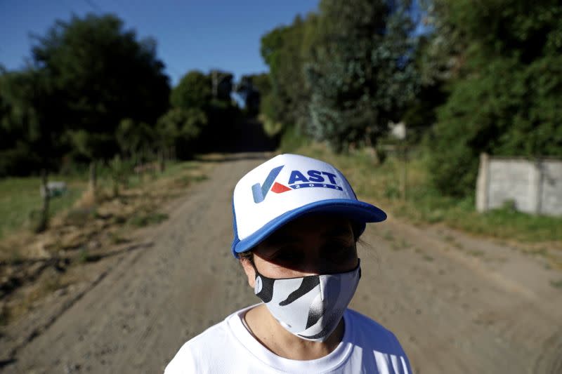 Supporter of Chilean presidential candidate Jose Antonio Kast prepares to attend a rally in Yumbel