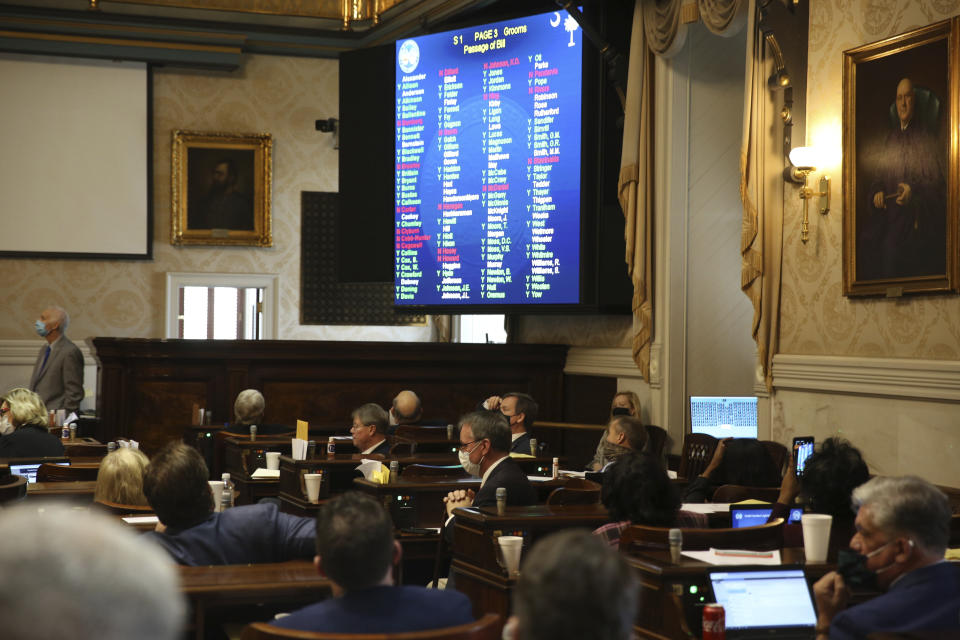 South Carolina Rep. David Hiott, R-Pickens, says a prayer as the House votes on a bill that would ban most abortions in the state on Wednesday, Feb. 17, 2021 in Columbia, S.C. The bill will soon go to the governor. (AP Photo/Jeffrey Collins)