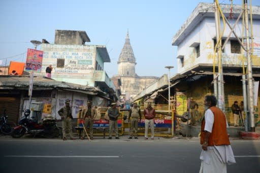 Police in Ayodhya were seen checking vehicles and stopping some passers-by for questioning as they sought to prevent any flare-up in violence