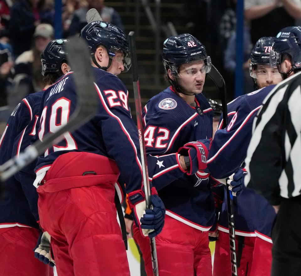 Sept. 24, 2023; Columbus, Oh., USA; 
Columbus Blue Jackets forward Alexandre Texier (42) celebrates after scoring against the Pittsburgh Penguins during the first period of Sunday's hockey game at Nationwide Arena.
