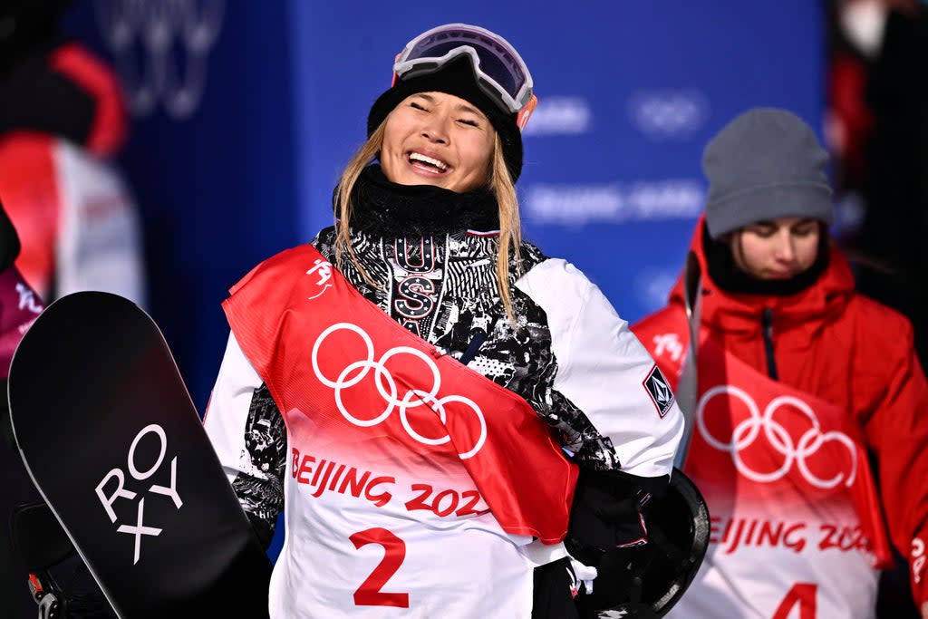 USA's Chloe Kim celebrates as she wins the snowboard women's halfpipe final run during the Beijing 2022 Winter Olympic Games (AFP via Getty Images)