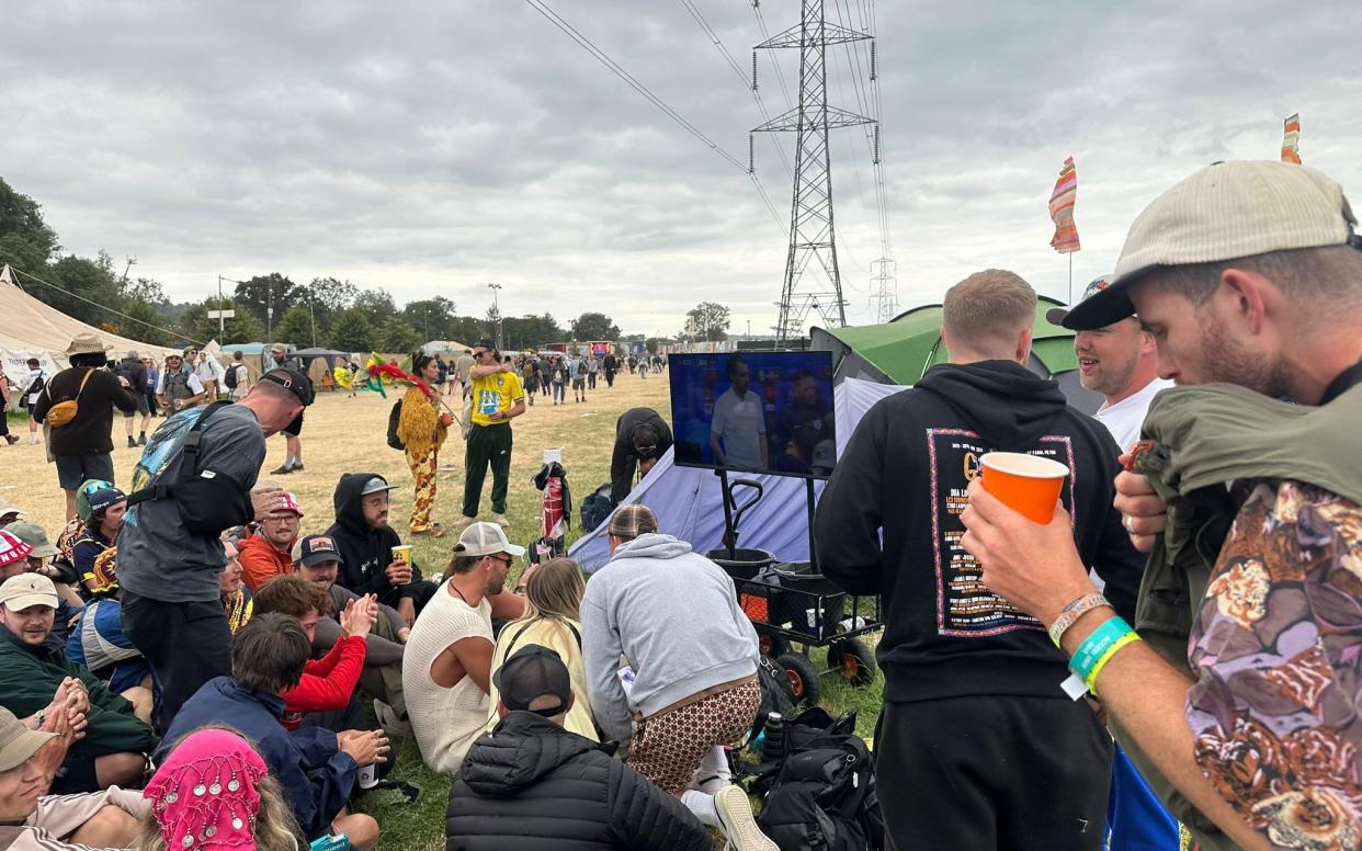 Fans watching the football