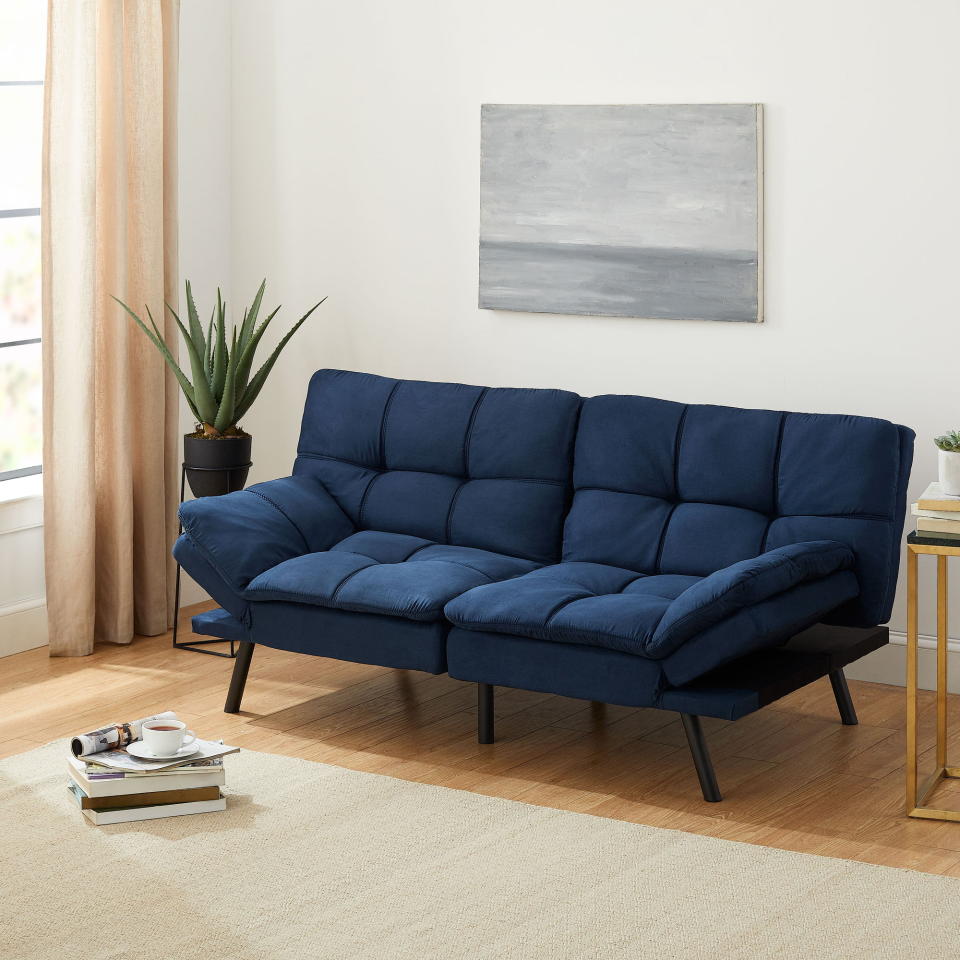 <p><a href="https://go.redirectingat.com?id=74968X1596630&url=https%3A%2F%2Fwww.walmart.com%2Fip%2FMainstays-Memory-Foam-Futon-Blue-Faux-Suede%2F1383997084&sref=https%3A%2F%2Fwww.housebeautiful.com%2Fshopping%2Ffurniture%2Fg3816%2Fcozy-couches-and-chairs%2F" rel="nofollow noopener" target="_blank" data-ylk="slk:Shop Now;elm:context_link;itc:0;sec:content-canvas" class="link ">Shop Now</a></p><p>Mainstays Memory Foam Futon</p><p>$198.00</p><p>walmart.com</p><span class="copyright">Walmart</span>