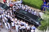 <p>Miami Marlins players and members of the Marlins organization and their fans surround the hearse carrying Miami Marlins pitcher Jose Fernandez to pay their respects on September 28, 2016 in Miami, Florida. Mr. Fernandez was killed in a weekend boat crash in Miami Beach along with two friends. (Photo by Rob Foldy/Getty Images) </p>