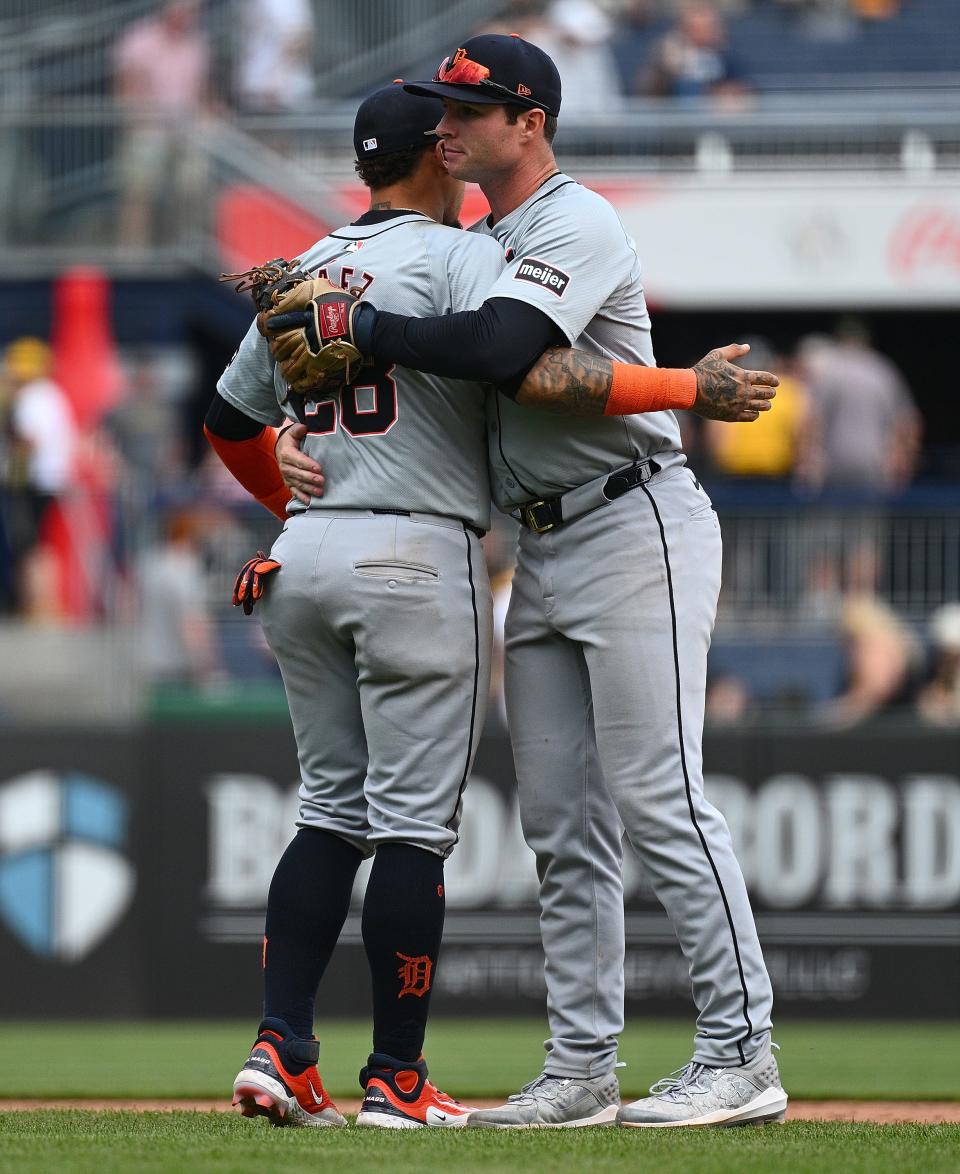 Detroit Tigers' Javier Baez, left, hugs Colt Keith after the final out in a 5-3 win over the Pittsburgh Pirates during the game at PNC Park on April 9, 2024 in Pittsburgh.