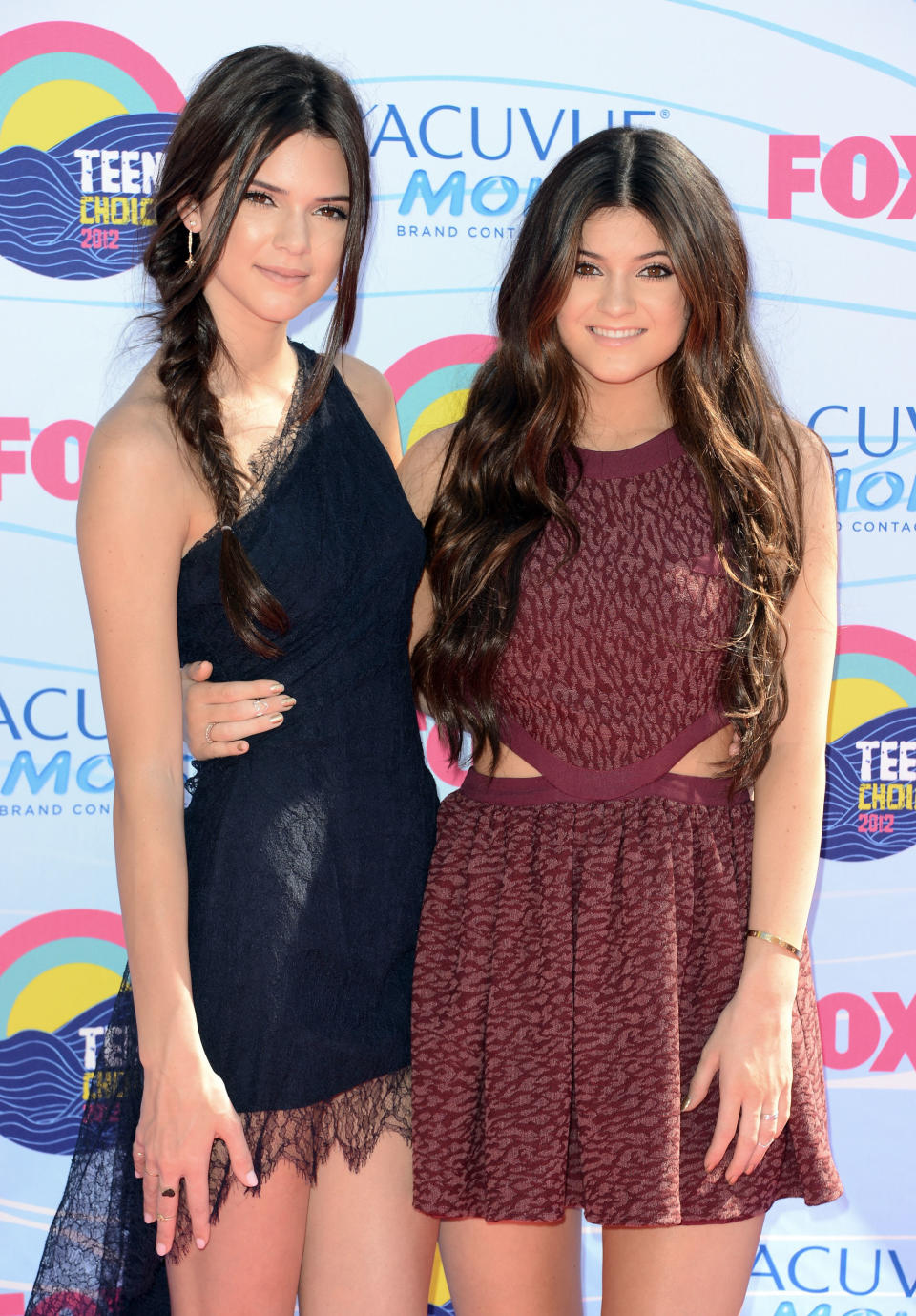 Kendall and Kylie Jenner arrive at the 2012 Teen Choice Awards at Gibson Amphitheatre on July 22, 2012 in Universal City, California.