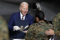 President Joe Biden serves dinner at Marine Corps Air Station Cherry Point in Havelock, N.C., Monday, Nov. 21, 2022, at a Thanksgiving dinner with members of the military and their families. (AP Photo/Patrick Semansky)