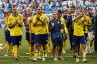 <p>Swedish players applaud at Sweden’s fans after losing to England </p>