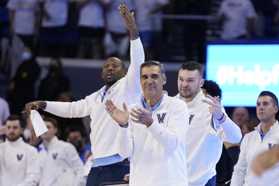 Villanova head coach Jay Wright claps from the bench during overtime of an NCAA college basketball game against UCLA Friday, Nov. 12, 2021, in Los Angeles. (AP Photo/Marcio Jose Sanchez)