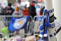 <p>Supporters pay tribute to the Leicester City owner after the crash which killed five people. Aaron Chown/PA Wire </p>