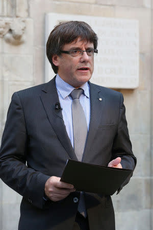 Catalan Regional President Carles Puigdemont records a statement at the regional government headquarters, the Generalitat Palace, in Barcelona, Spain, September 21, 2017. Catalan Goverment/Ruben Moreno Garcia/Handout via REUTERS