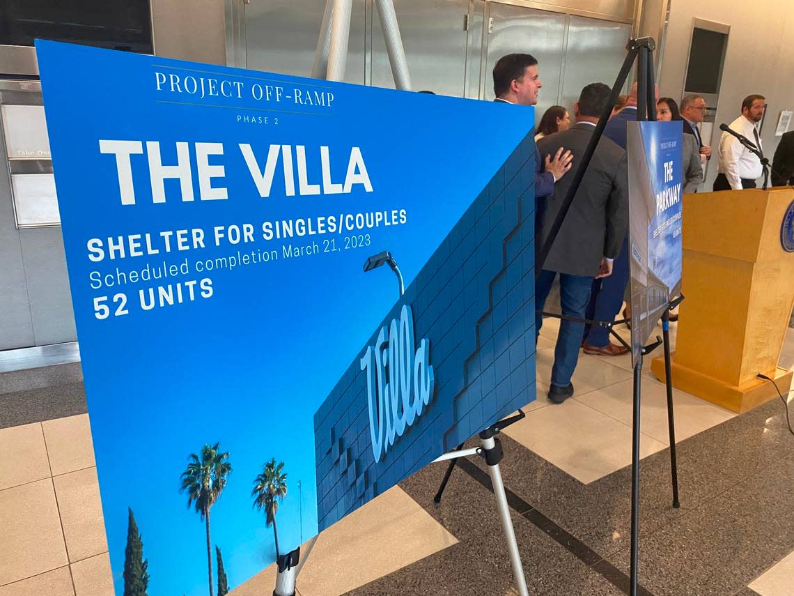 A poster touts the Villa Motel on Parkway Drive that opened Tuesday, March 21, 2023, with 52 units of affordable housing for the homeless, according to officials.