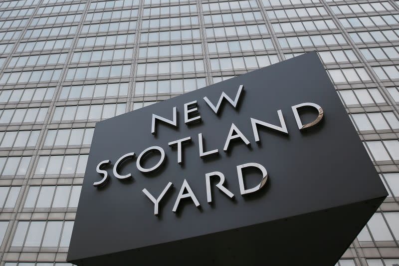 FILE PHOTO: The rotating triangular sign is seen outside New Scotland Yard in central London