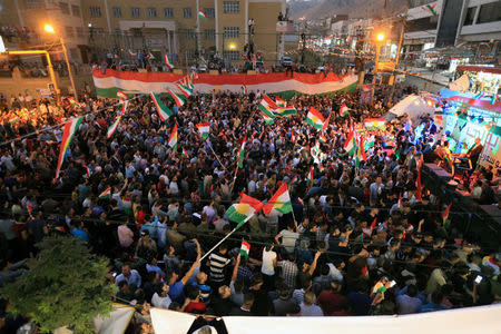 Kurds celebrate to show their support for the independence referendum in Duhok, Iraq, September 26, 2017. REUTERS/Ari Jalal