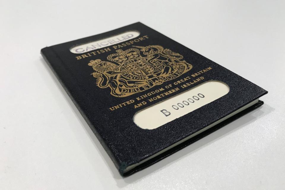 The original blue passport, which was subsequently replaced by the burgundy EU British design: REUTERS