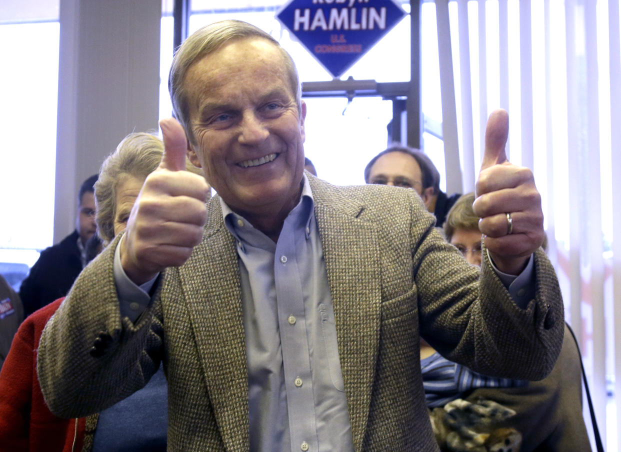 FILE - In this Nov. 5, 2012, file photo, Missouri Republican Senate candidate, Rep. Todd Akin, R-Mo., gives two thumbs up as he enters a Republican campaign office to visit with supporters in Florissant, Mo. Akin, whose comment that women's bodies have a way of avoiding pregnancies in cases of "legitimate rape" sunk his bid for the U.S. Senate and became a cautionary tale for other GOP candidates, has died. He was 74. (AP Photo/Jeff Roberson, File)