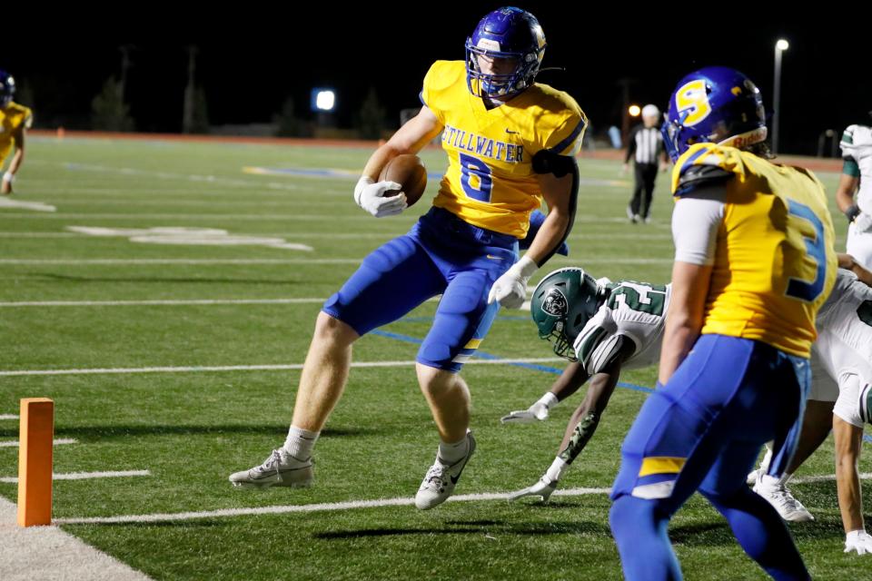 Stillwater's Josh Ford scores a touchdown during a high school football game between Muskogee and Stillwater in Stillwater, Okla., Friday, Nov. 3, 2023.