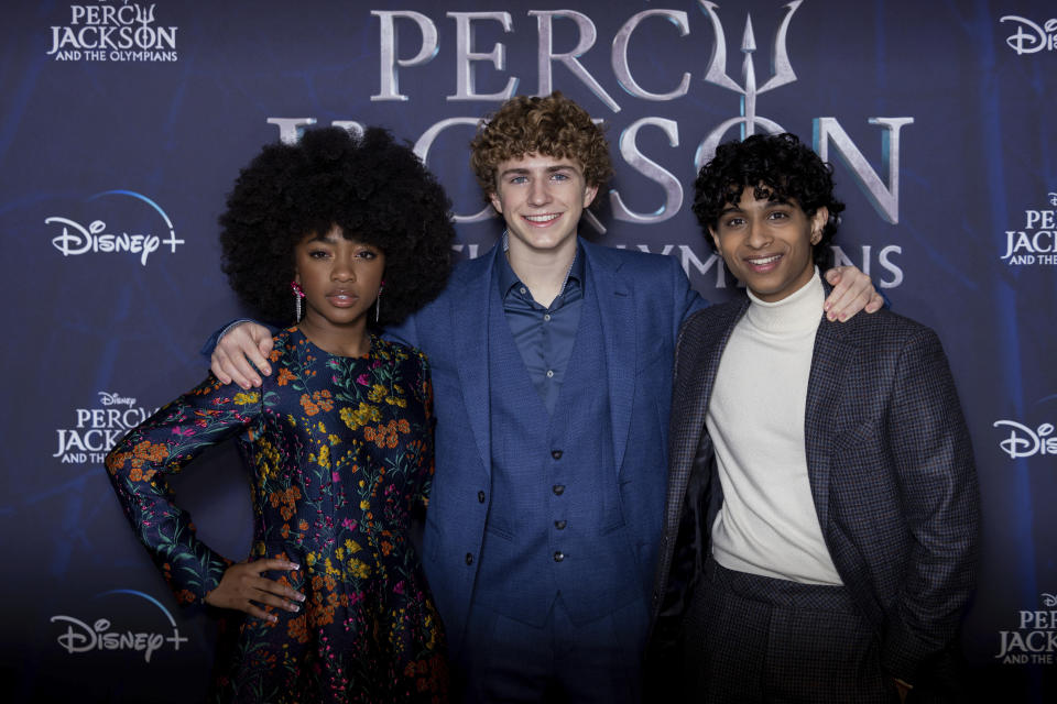 Leah Sava Jeffries, from left, Walker Scobell and Aryan Simhadri pose for photographers upon arrival at the premiere of the television series 'Percy Jackson and the Olympians' in London Saturday, Dec. 16, 2023. (Photo by Vianney Le Caer/Invision/AP)