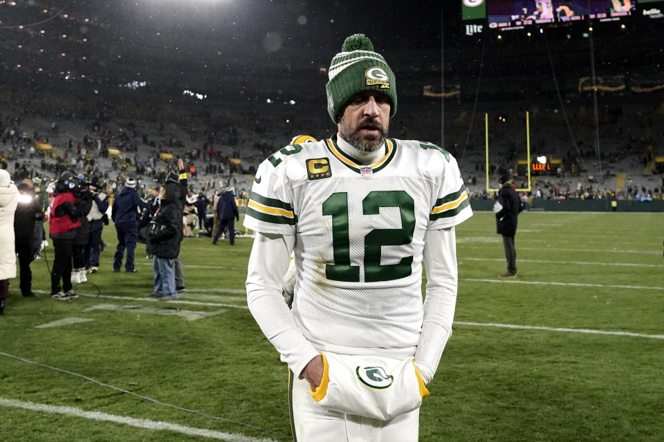 Green Bay Packers quarterback Aaron Rodgers (12) walks off the field after the team's NFL football game against the Tennessee Titans Thursday, Nov. 17, 2022, in Green Bay, Wis. (AP Photo/Morry Gash)