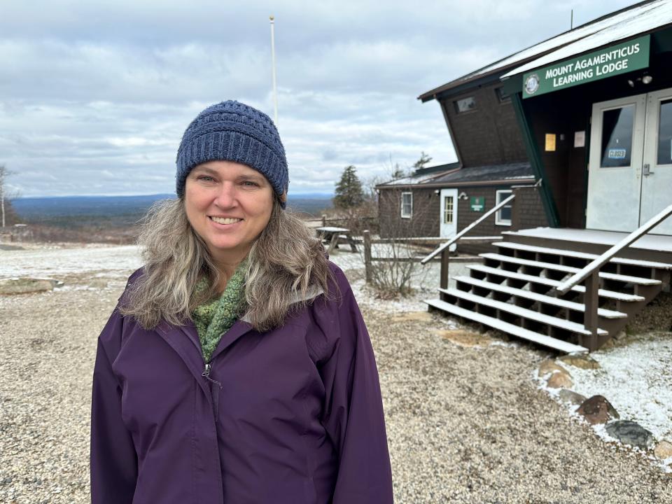 Mount Agamenticus Conservation Coordinator Robin Kerr at the summit of "Mount A," which will soon have new regulations that include $300-$400 fines.