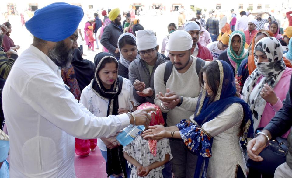 In the wake of COVID-19 outbreak, SGPC employees have been dispensing hand sanitizer to visitors as precautionary measure at the entrances of Golden Temple in Amritsar.