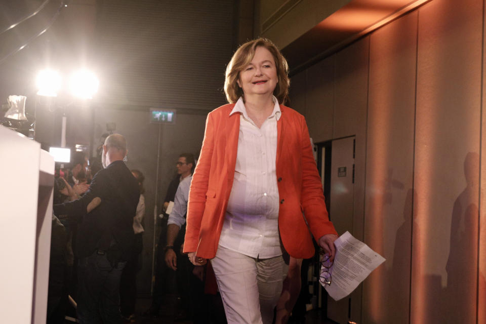 Nathalie Loiseau, center, head of French president Emmanuel Macron's party list, arrives to deliver her speech at the campaign headquarters, Sunday, May 26, 2019 in Paris. Exit polls in France indicated that Marine Le Pen's far-right National Rally party came out on top, in an astounding rebuke for French President Emmanuel Macron, who has made EU integration the heart of his presidency. (AP Photo/Kamil Zihnioglu)