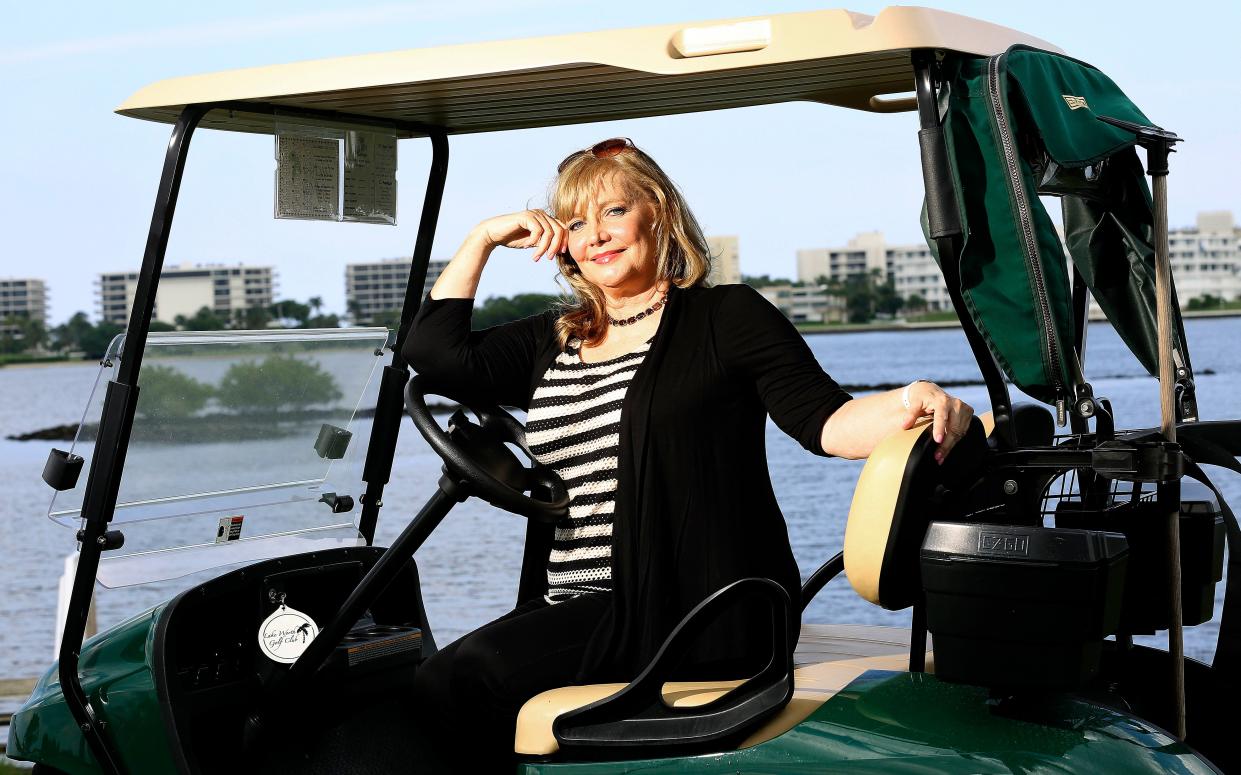 Cindy Morgan, actress and member of the cast of the classic comedy movie "Caddyshack," poses in October 2015 at the Lake Worth Municipal Golf Course in Lake Worth. Morgan died in late December at her home in Lake Worth Beach.