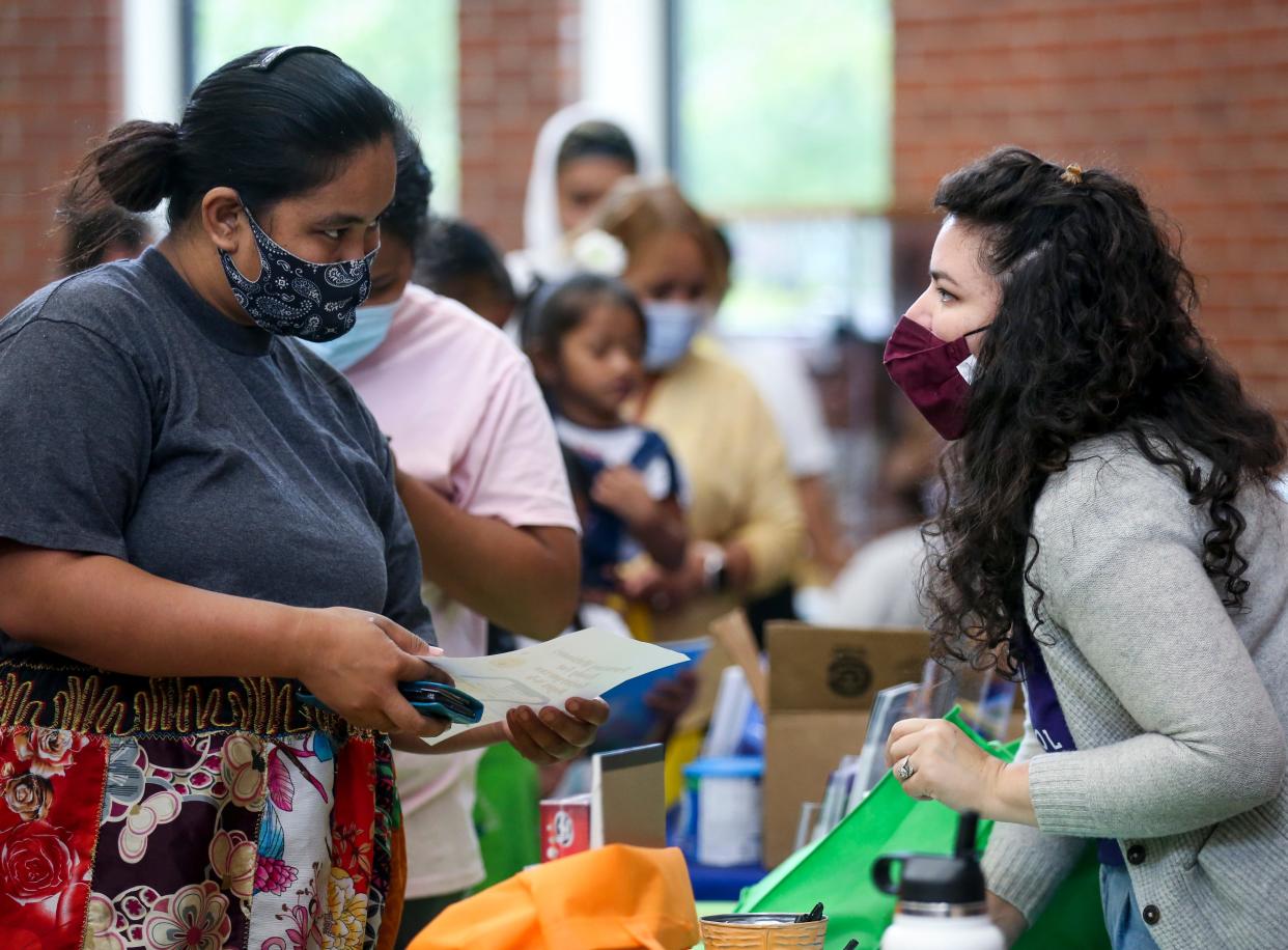 People attend the Micronesian Islander Community Resource Fair, which offered COVID-19 vaccines and other resources, in August at Chemeketa Community College in Salem.