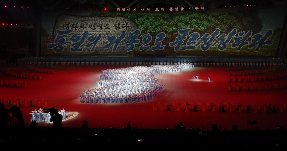 An image of a map of Korean peninsular is formed by performers during the mass games performance of "The Glorious Country" at May Day Stadium in Pyongyang, North Korea, Wednesday, Sept. 19, 2018. (Pyongyang Press Corps Pool via AP)