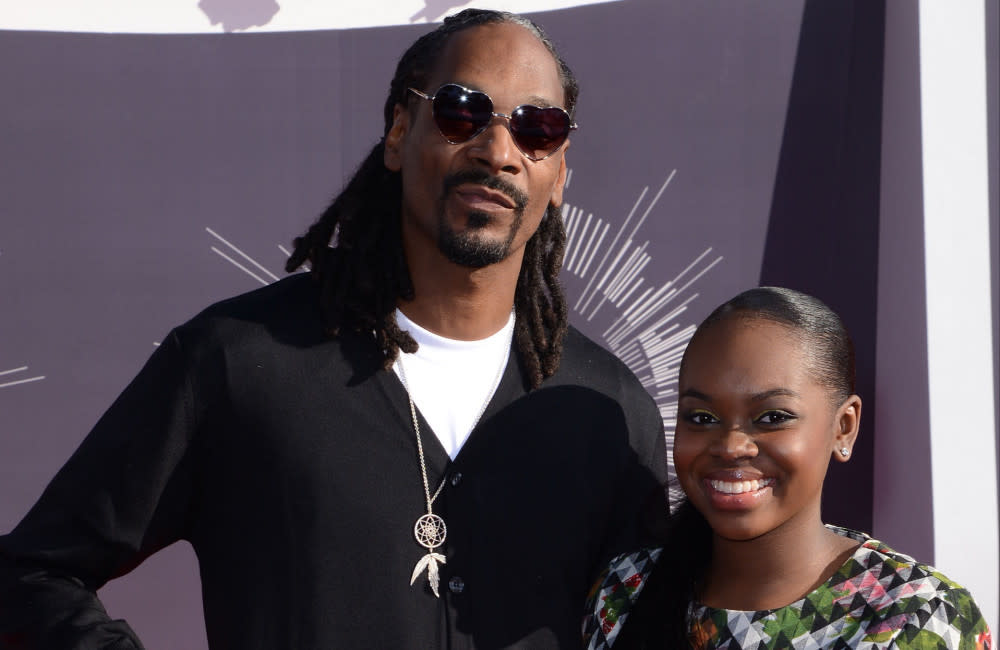 Snoop Dogg With Cori Broadus - 2014 MTV VMAs - California - Getty