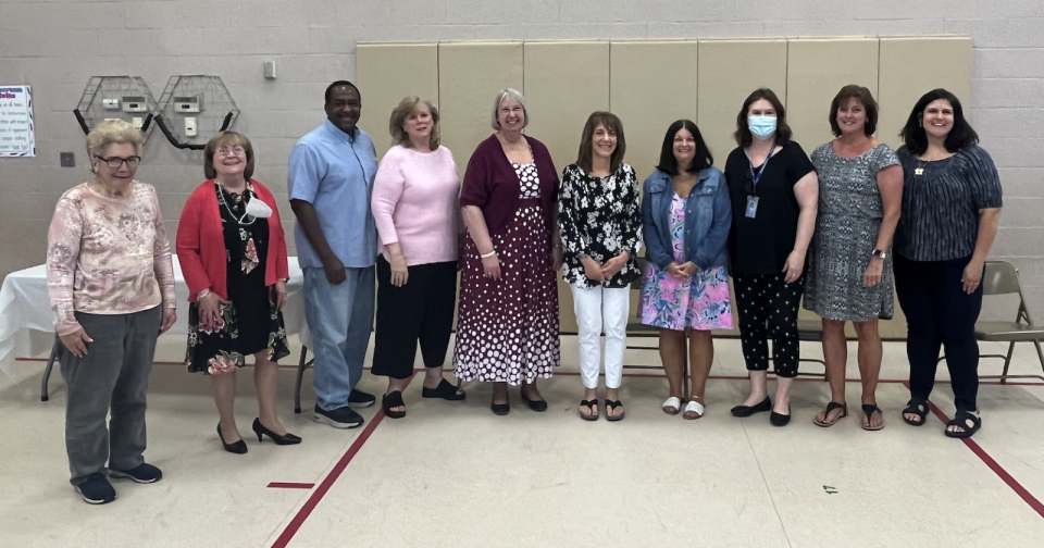 Ten of the eighteen 2021-2022 staff retirees attended the celebration. (Left to right): Yolanda Gregov, Colleen Haubert, William Washington, Elizabeth Gordon, Janice Krug, Laura Kelk, Donna Helock, Joan Marie Rosen, Karen Wetherell and Sondra Chernoff.