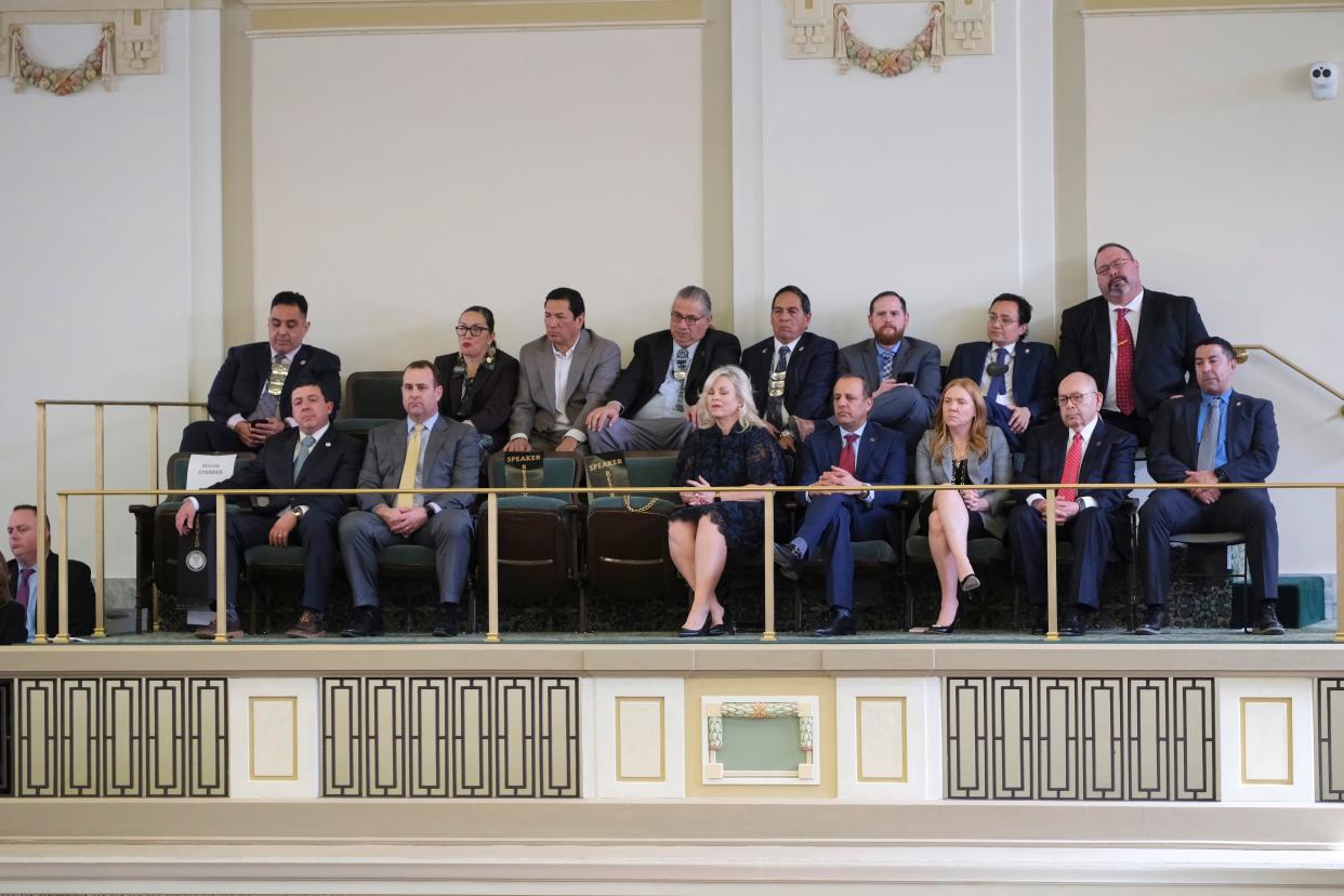 Leaders of six tribal nations sat together in the House chambers Feb. 6 at the Oklahoma Capitol to listen to Oklahoma Gov. Kevin Stitt’s State of the State address. They included Peoria Tribe Chief Craig Harper, front row, at left; Chickasaw Nation Gov. Bill Anoatubby, front row, second from right; Cherokee Nation Principal Chief Chuck Hoskin Jr., back row, second from right; and back row, from left to right: Muscogee Nation Second Chief Del Beaver; Cheyenne and Arapaho Tribes Governmental Affairs Liaison LaRenda Morgan and Gov. Reggie Wassana; Seminole Nation Chief Lewis Johnson and Muscogee Nation Principal Chief David Hill.
