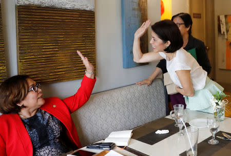 Philippine Environment Secretary Regina Lopez greets a friend after attending a meeting in Manila, Philippines February 9, 2017. REUTERS/Erik De Castro