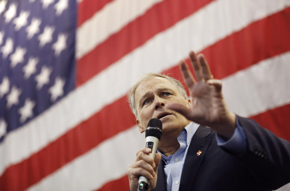 Washington Gov. Jay Inslee speaks at the Battle Born Progress Progressive Summit, Saturday, Jan. 12, 2019, in North Las Vegas, Nev. Inslee pitched his record tackling climate change, gun control measures, raising the minimum wage and expanding paid family leave to Nevada progressive activists in the early presidential nominating state. (AP Photo/John Locher)