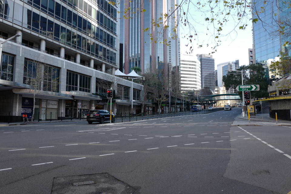 SYDNEY, AUSTRALIA - JULY 13: Deserted streets in the suburb of North Sydney on July 13, 2021 in Sydney, Australia. Lockdown restrictions have been tightened across NSW as COVID-19 cases continue to emerge in the community. Restrictions are in place across Greater Sydney, the Blue Mountains, the Central Coast and Wollongong with all residents subject to stay-at-home orders are only permitted to leave their homes for essential reasons, including purchasing essential goods, accessing or providing care or healthcare, work, education and exercise. As of 5pm on Friday, exercise is limited to within a 10km radius from home or within the local government area, and with a maximum of two people per group. Browsing in shops is prohibited and only one person per household can leave home for shopping per day. Outdoor public gatherings are limited to two people, while funerals are limited to 10 people only. (Photo by James D. Morgan/Getty Images)